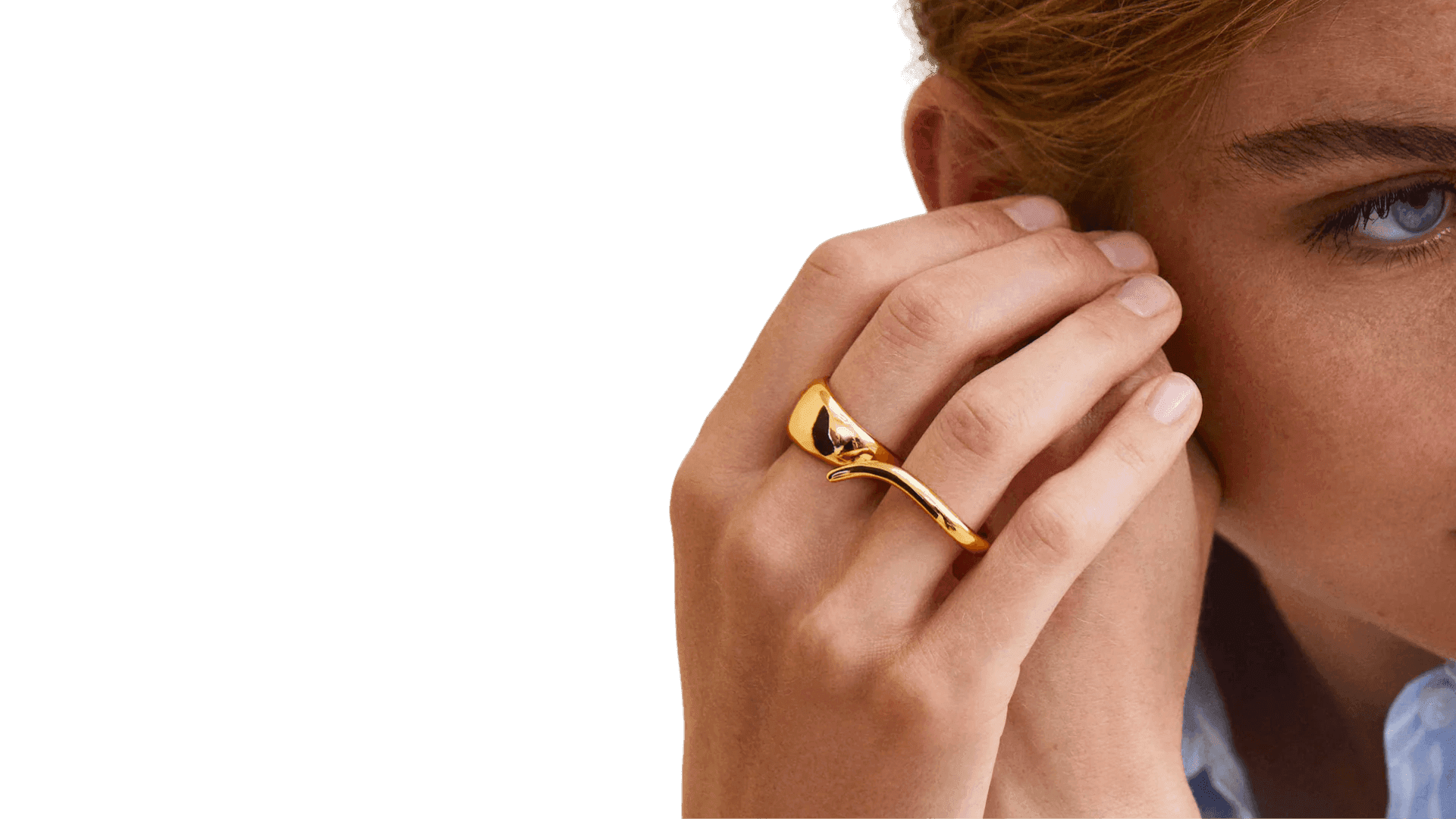 Model wearing gold ring